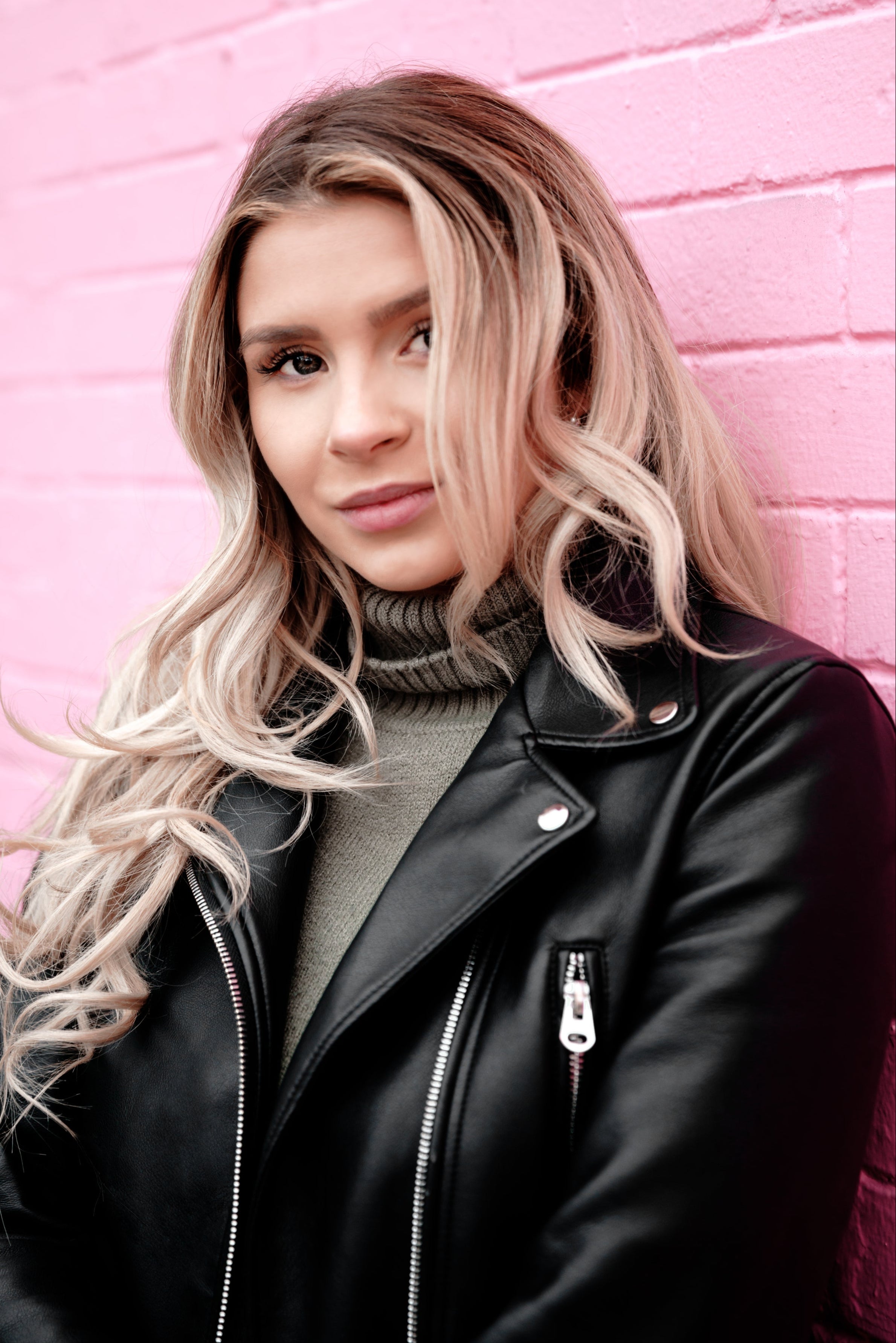 files/woman-portrait-on-pink-brick.jpg